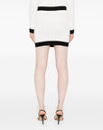 Balmain Button-embellished ribbed-knit mini skirt