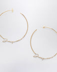 JACQUEMUS Gold hoop earrings with logo