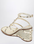 Valentino Garavani Rockstud wedge sandals in platinum color