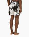 Alexander McQueen Abstract print swim shorts with logo