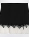Alexander McQueen Mini skirt with black/ivory spider lace