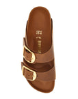 Birkenstock oiled leather cognac slippers with large golden buckles