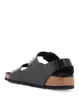 Birkenstock black leather sandals with three large buckles