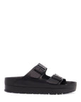 Birkenstock black leather platform sandals with two straps and metal buckles