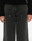 Golden Goose jeans with distressed effect and front patches
