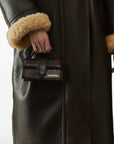 JACQUEMUS The Big Child Shoulder bag with flap.