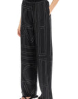 Toteme monogram silk pajama pants