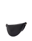 Toteme black calfskin half-moon bag with adjustable shoulder strap