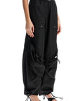 The Attico high-waisted black elasticated loose fit trousers with pockets