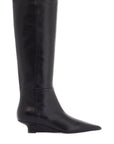 Toteme black leather knee-high boots with low heel and pointed toe