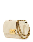 Valentino Garavani small shoulder bag in leather with golden chain butter white