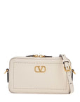 Valentino Garavani mini camera case in ivory leather with adjustable strap and golden details