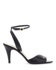 Valentino Garavani black goat leather sandals with gold buckle and stiletto heel