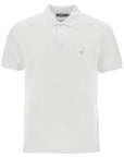 Moschino white cotton polo with delicate embroidery