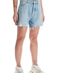 Balmain destroyed denim shorts for a casual