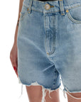 Balmain destroyed denim shorts for a casual