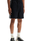 Y-3 black cotton shorts with white stripes