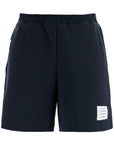 Thom Browne navy combo mid thigh ripstop and wool shorts