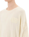 Off-White sweater with embossed diagonal motif