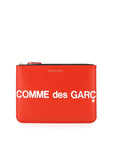 Comme Des Garcons Wallet leather pouch with logo